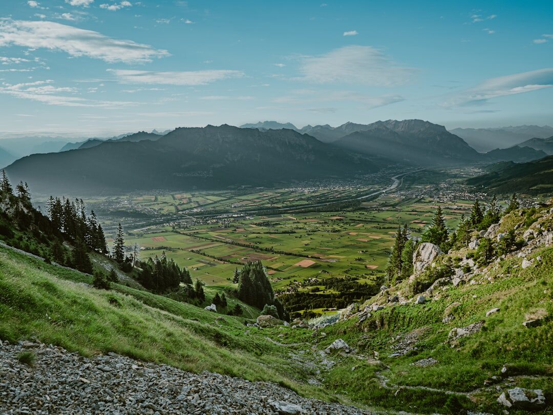 Panoramic view of Swiss mountains and a green valley